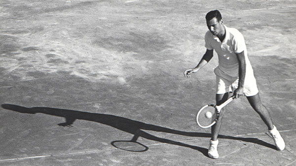 An avid tennis player, Joram Piatigorsky returns a serve